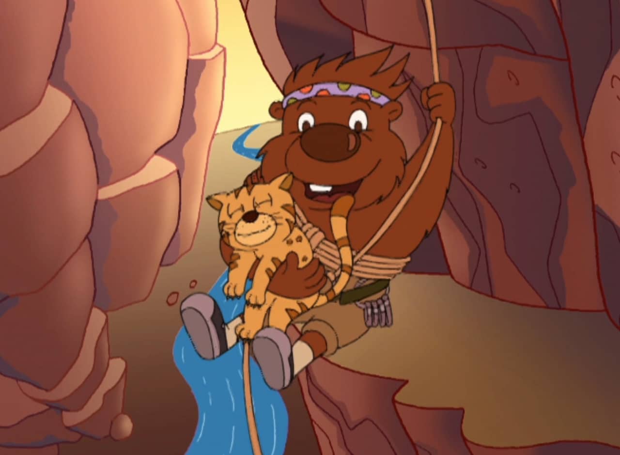 Gung-Ho Gopher rope swinging into a canyon to save a wild cat