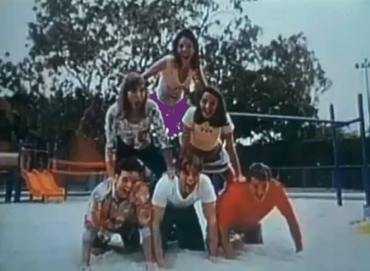 six friends making a human pyramid