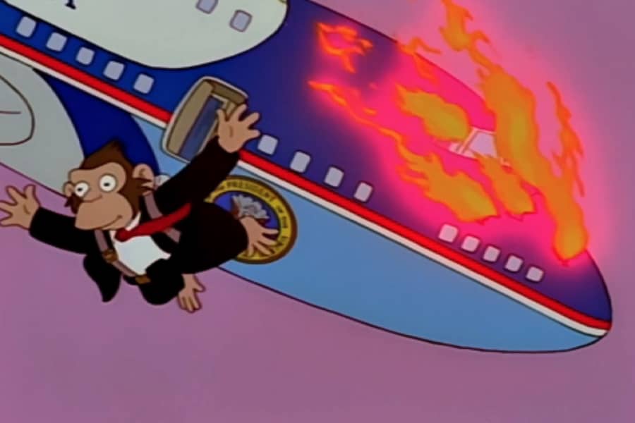 chimp President jumping from Air Force One that is on fire