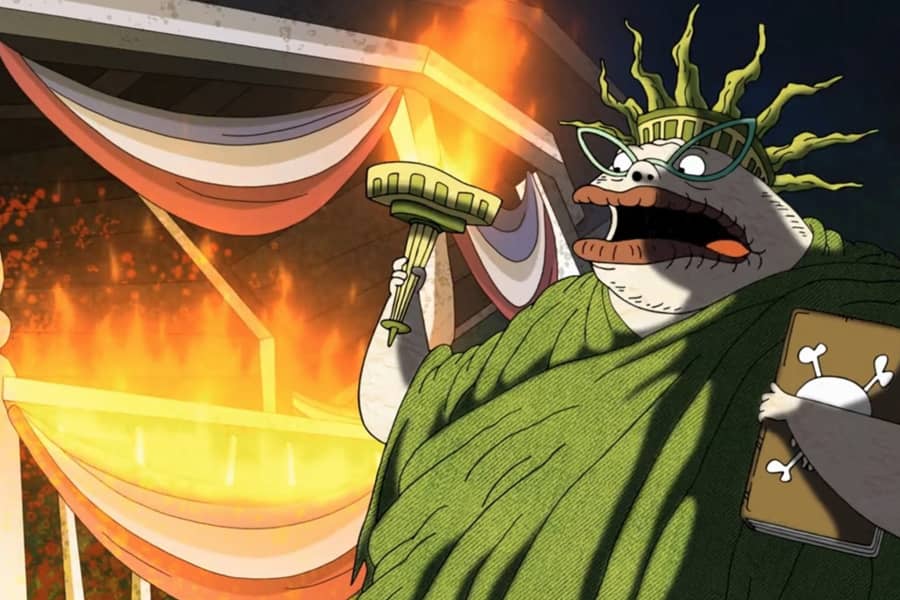 monster dressed as the Statue of Liberty, a pergola is on fire behind