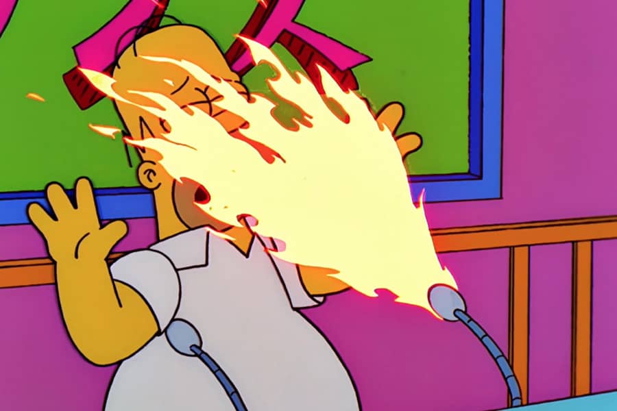 contestant Homer Simpson getting a flame in the face