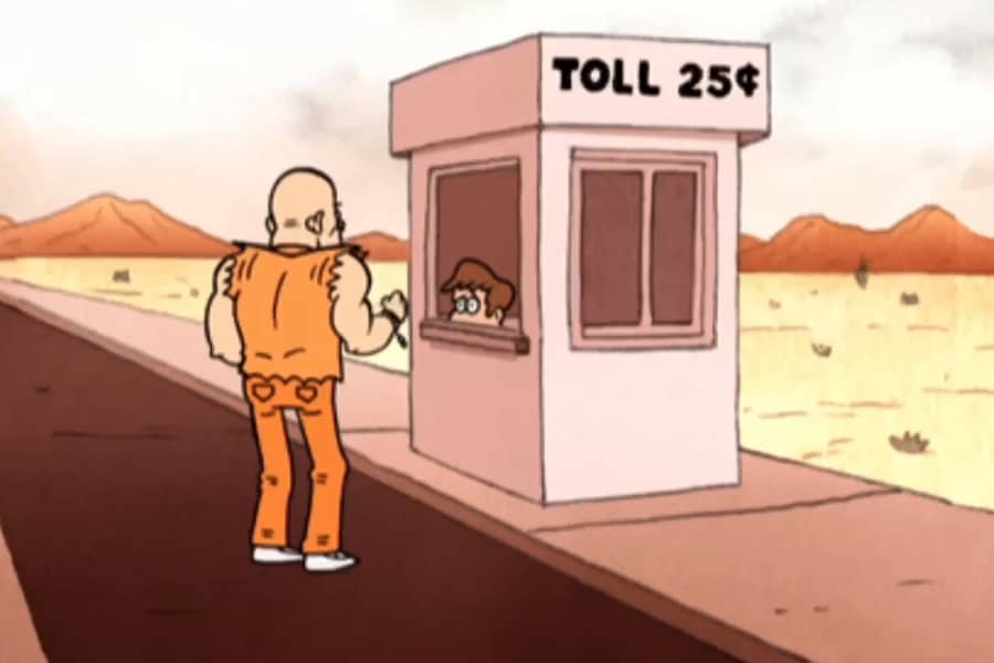 convict stands near a toll booth in the desert, a man’s face peeking out