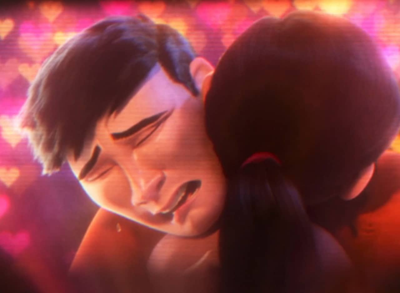 man cries as he embraces a woman