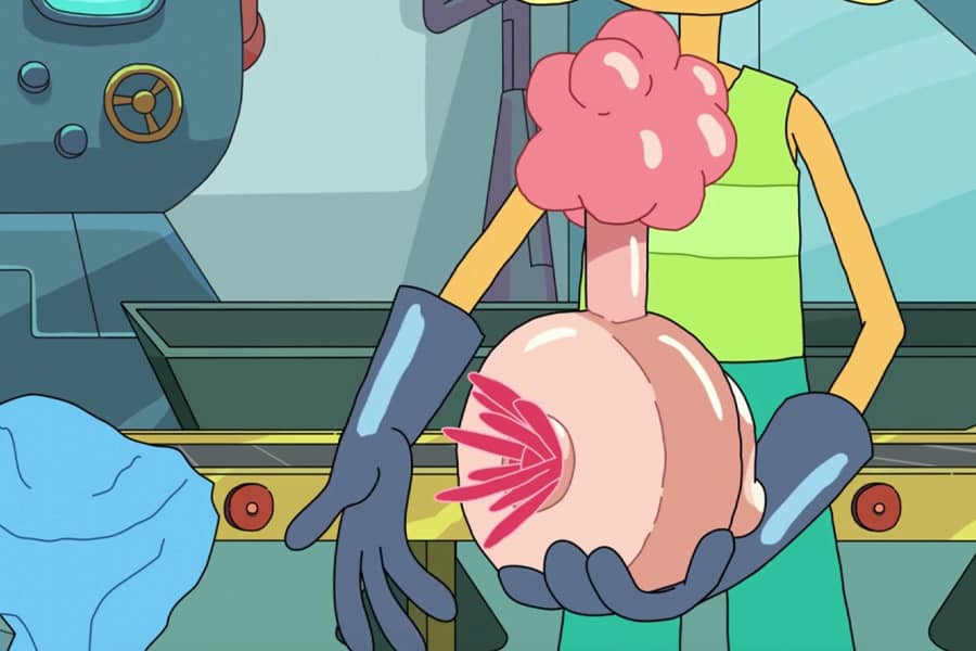a worker showcases a finished plumbus