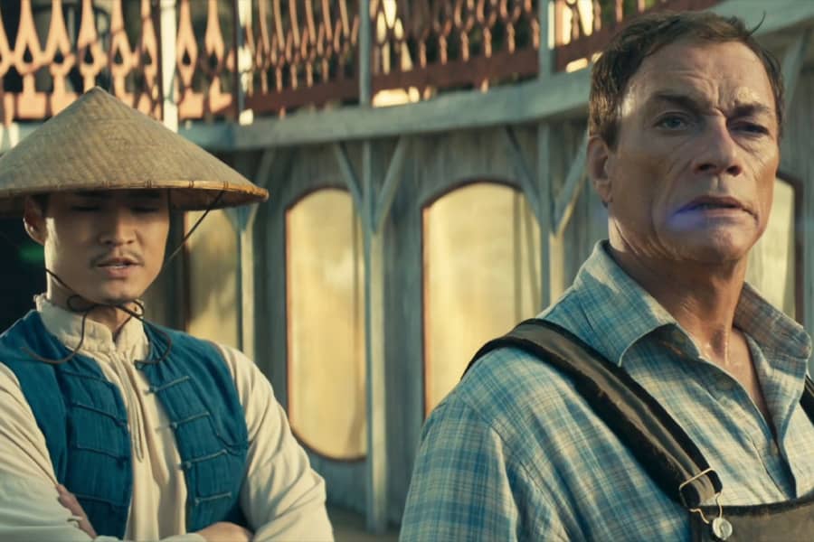 Huck with Jim, an Asian man wearing a sunhat