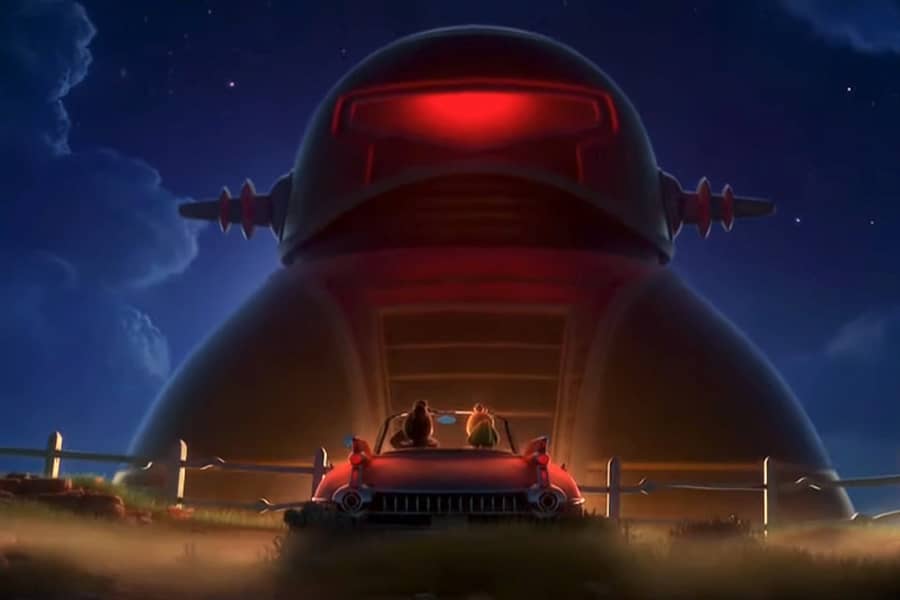 alien ship rises above a couple in a car