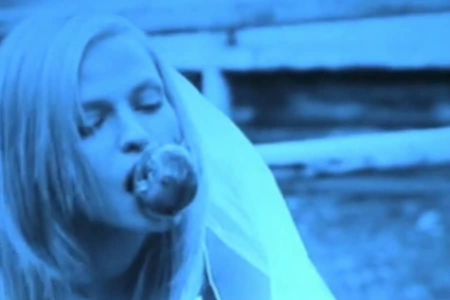 Simone with a whole apple in her mouth