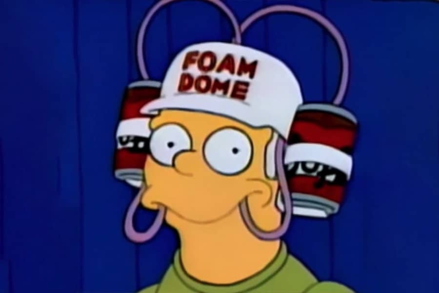 guy wearing Foam Dome hat with that holds two beers and drinks them through bending straws