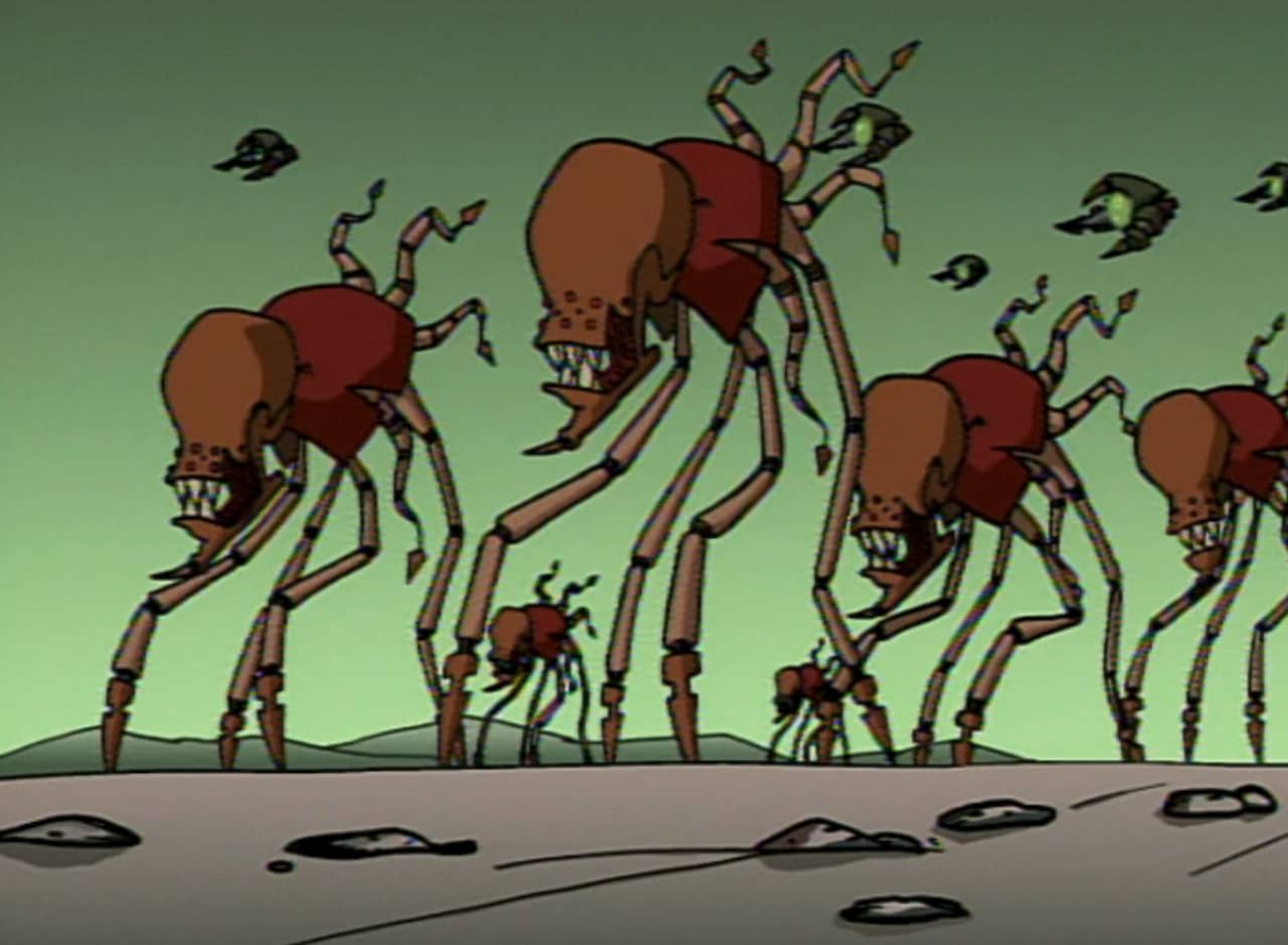big bug-like aliens walking through a desert