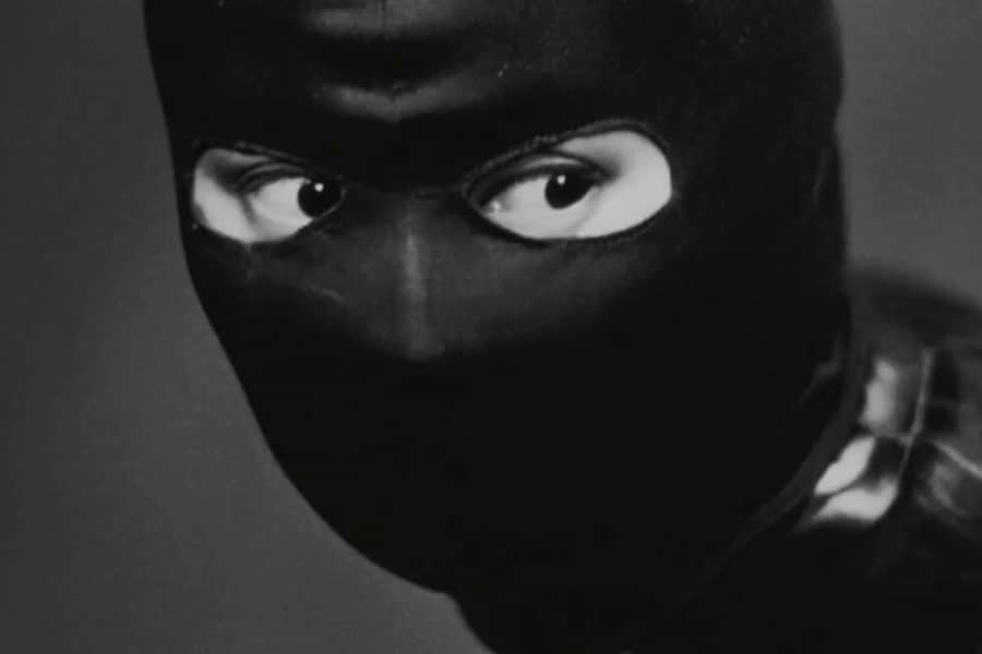 closeup of the woman in the ski mask