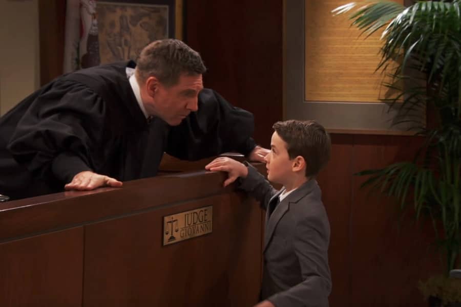 young boy speaking with Judge Giovanni