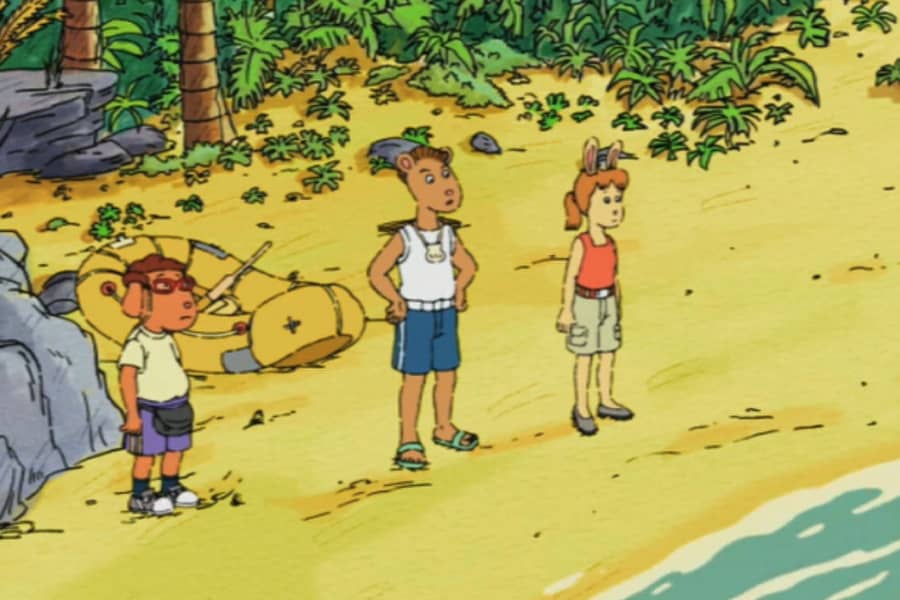 three teens on the beach next to a life raft