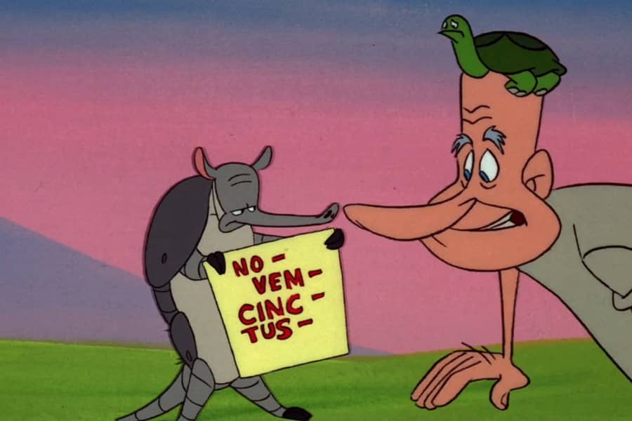 Martin Pardon with the armadillo who is holding a sign that says “no-vem-sinc-tus-