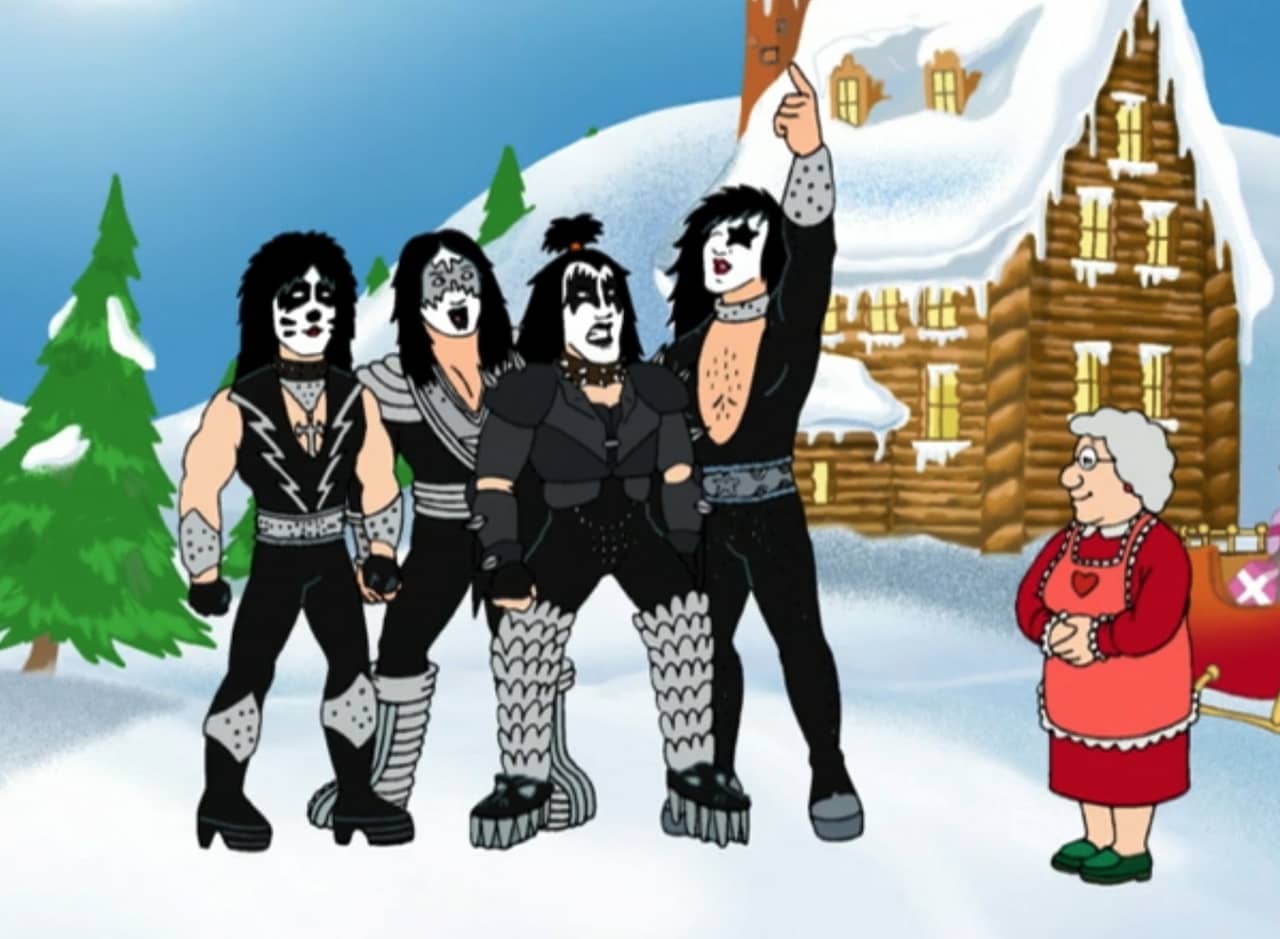 the rock band KISS at the North Pole with Mrs. Claus