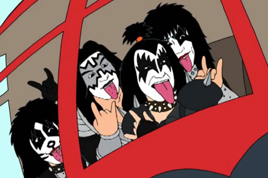 KISS gives the metal sign from a helicopter