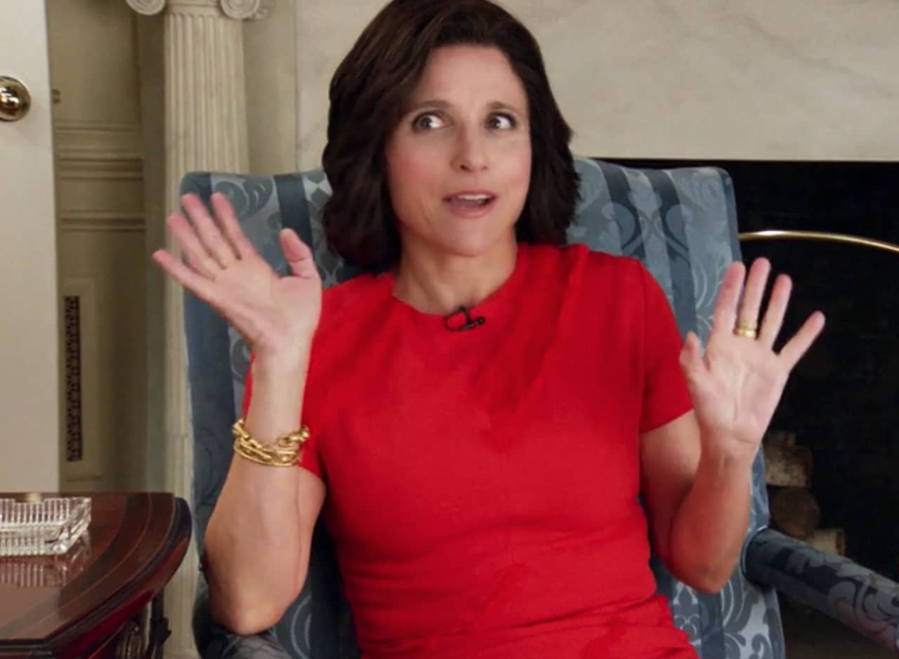 Selina Meyer giving an interview