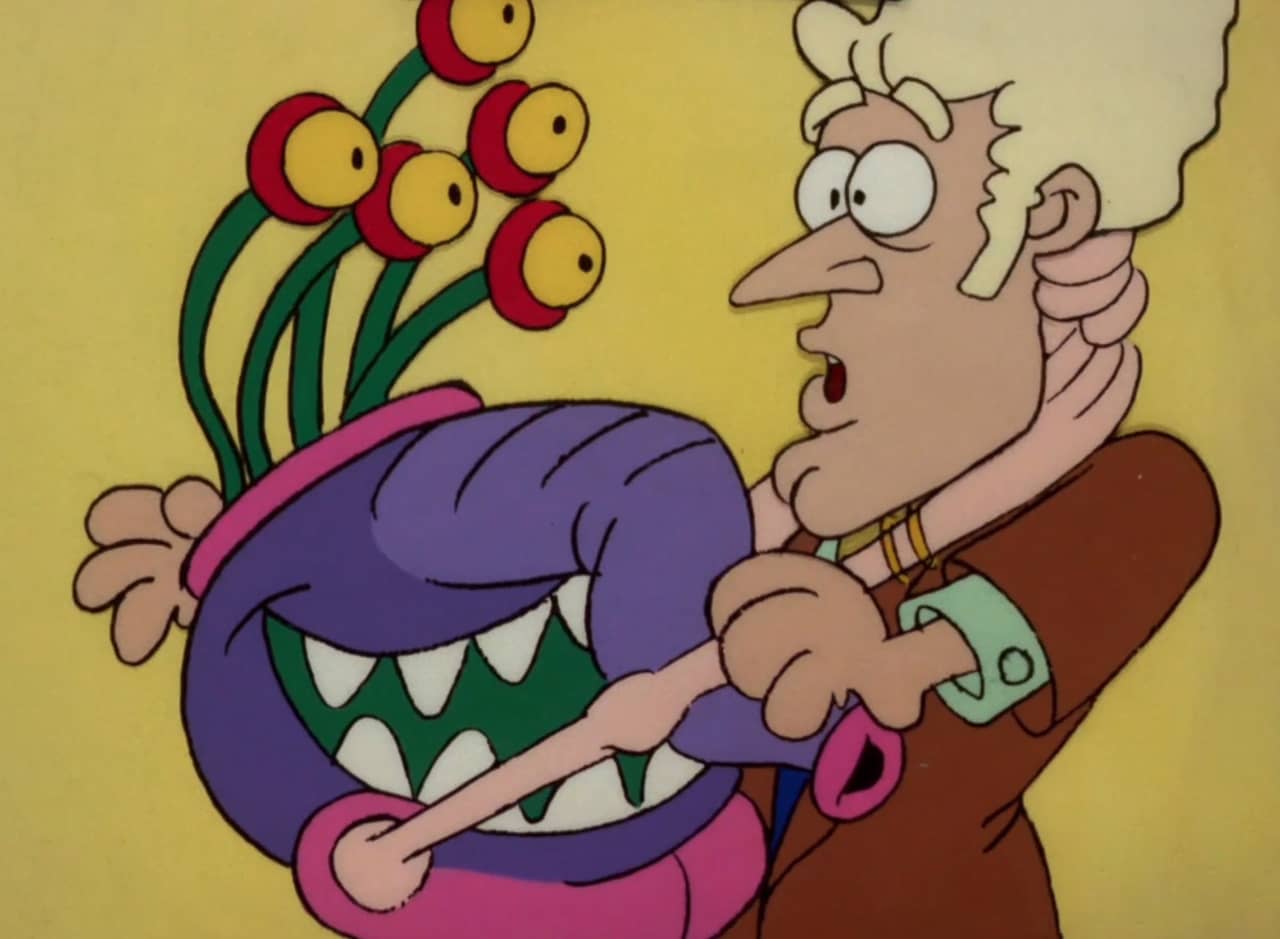 scared man hugging a woman who has a monster face with multiple eyes, sharp teeth, and an elephant trunk