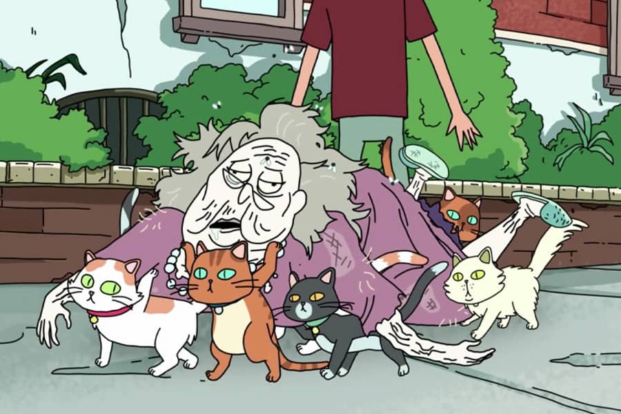 a group of cats carry Mrs. Sullivan’s corpse down the sidewalk