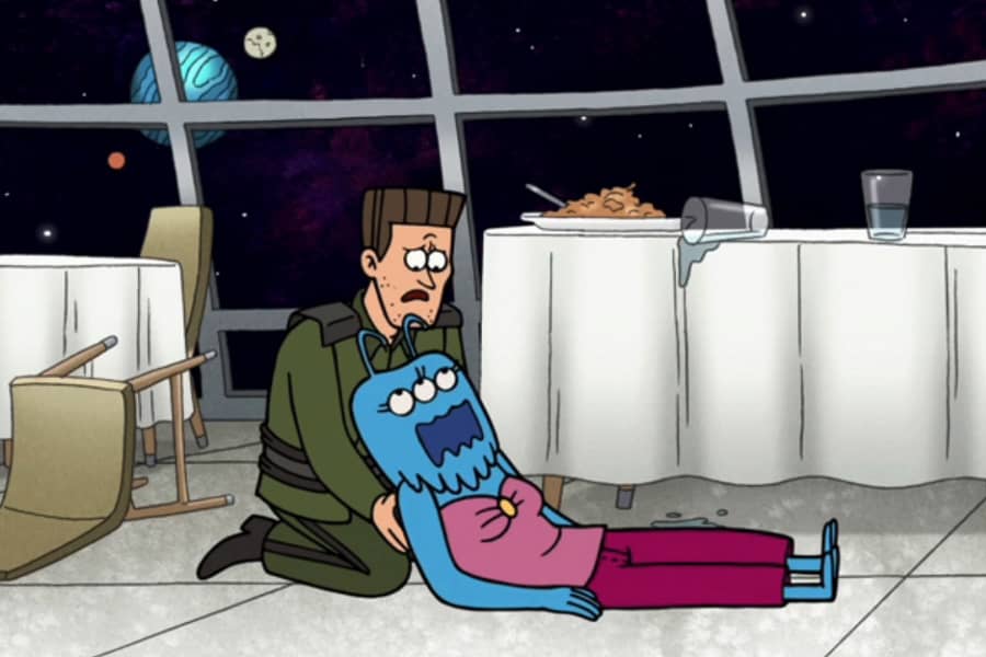 Brick LeFever holding an alien woman who is dying