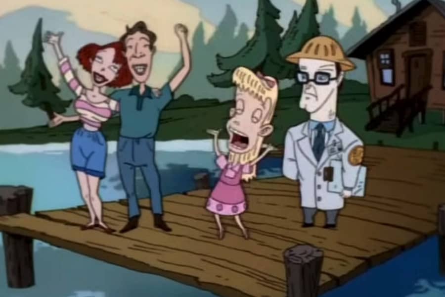 girl and her parents cheering next to a guy from Big Oil