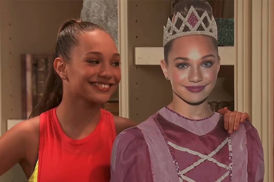 Eiffel with a cardboard cutout of herself as a princess