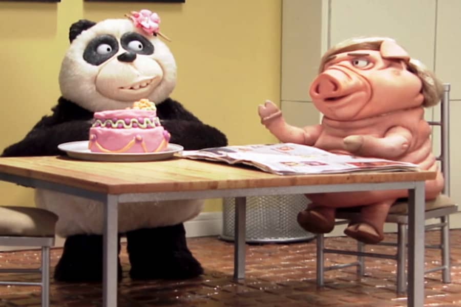Jake at the kitchen table with Chi Chi who has just made a birthday cake
