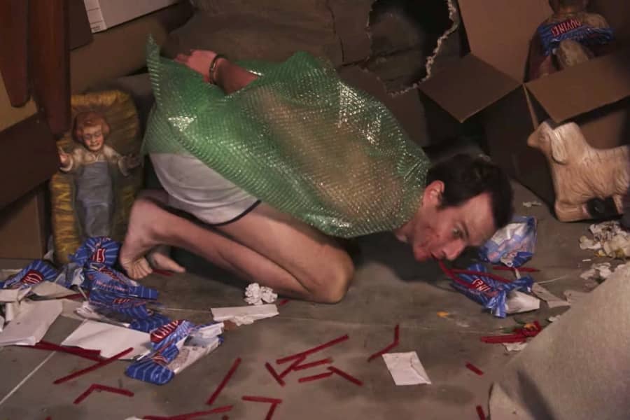 G.O.B. Bluth is in the storage unit dressed in bubble wrap and eating Red Vines off the ground