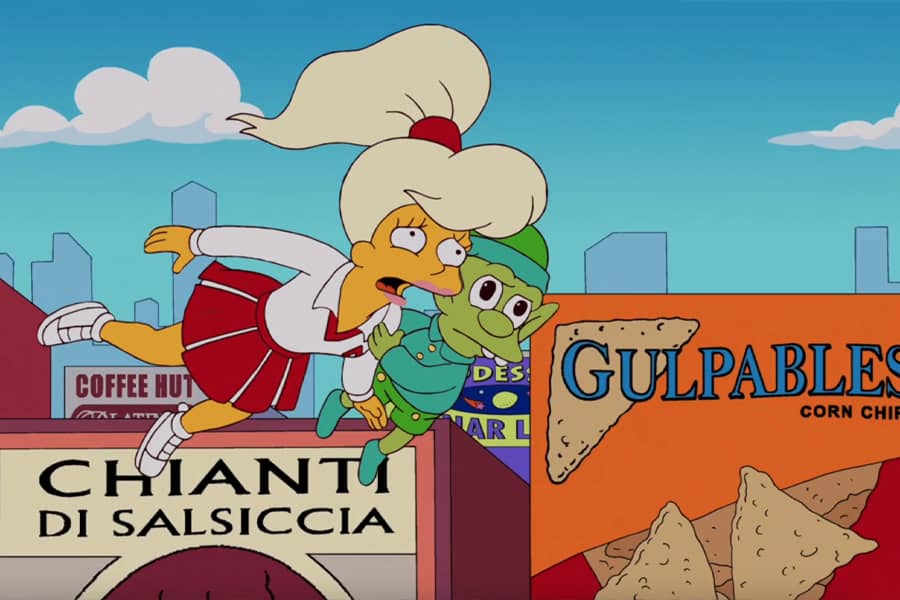 Stacy and the elf flying through the air with more branded buildings behind them