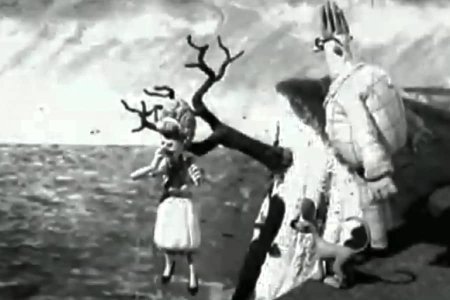 Arnold and the dog see a woman stuck on a branch at the edge of a cliff