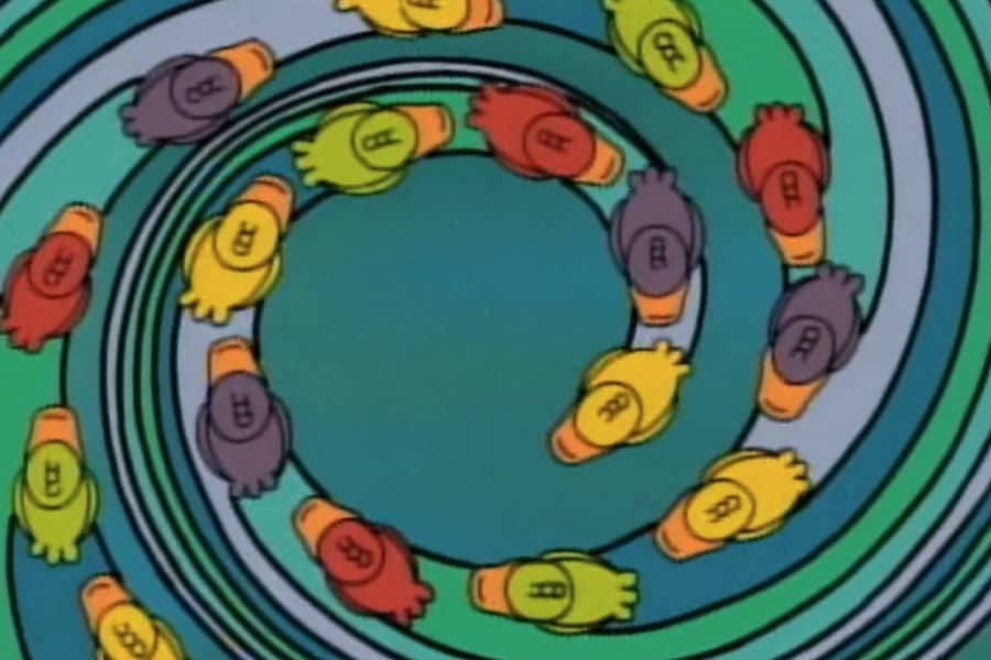 ducks swimming in a colorful spiral