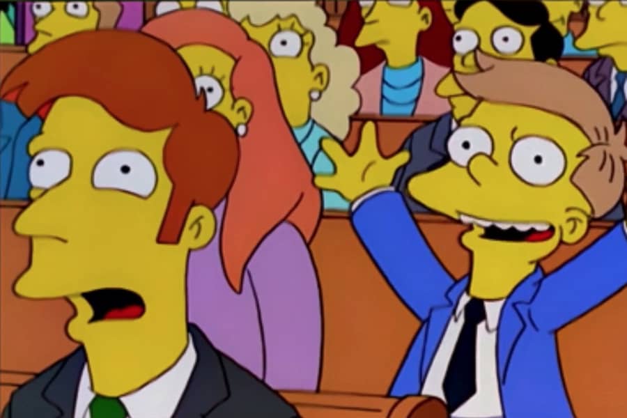 audience is aghast except a young boy who is excited