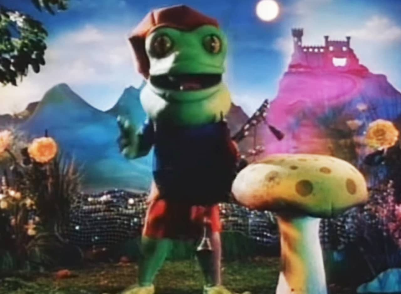 a frog wearing a kilt and playing the bagpipes in a colorful fantasy land