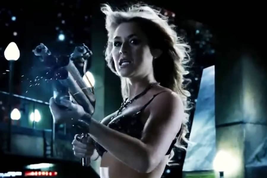 Alexa Vega as Killjoy, wielding a huge gun