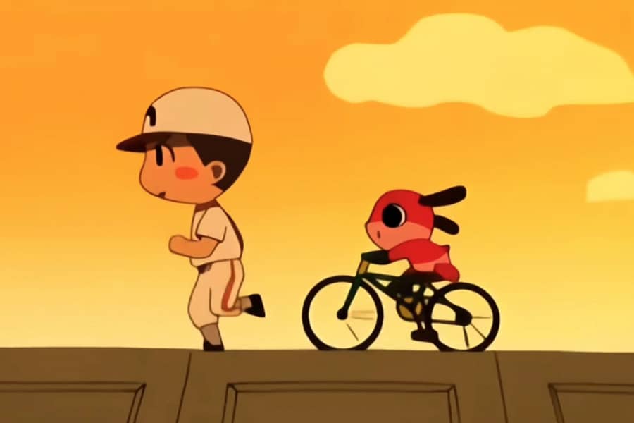 the boy running and Maromi is riding a bike behind him