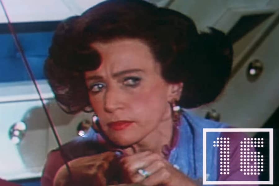 woman contestant thinking, a timer on screen at 16 seconds