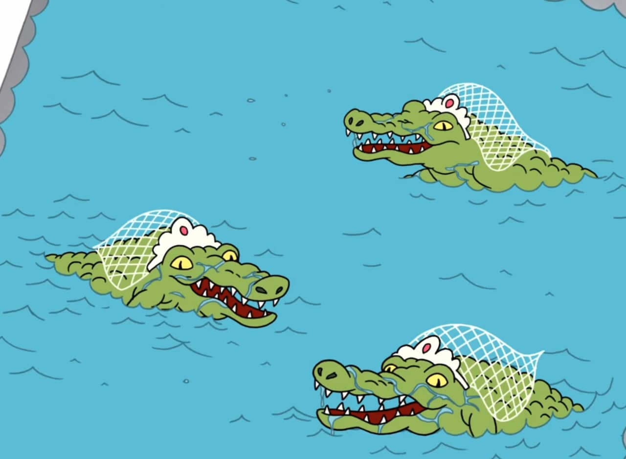 water with three alligators wearing bridal veils