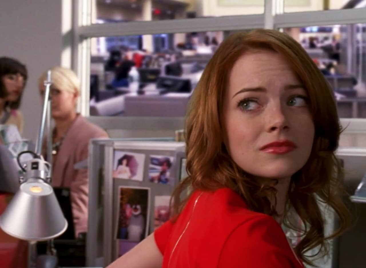Emma Stone looks longingly in the distance