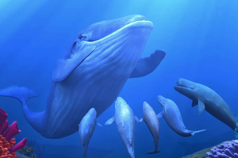a big whale leading a choir of smaller whales