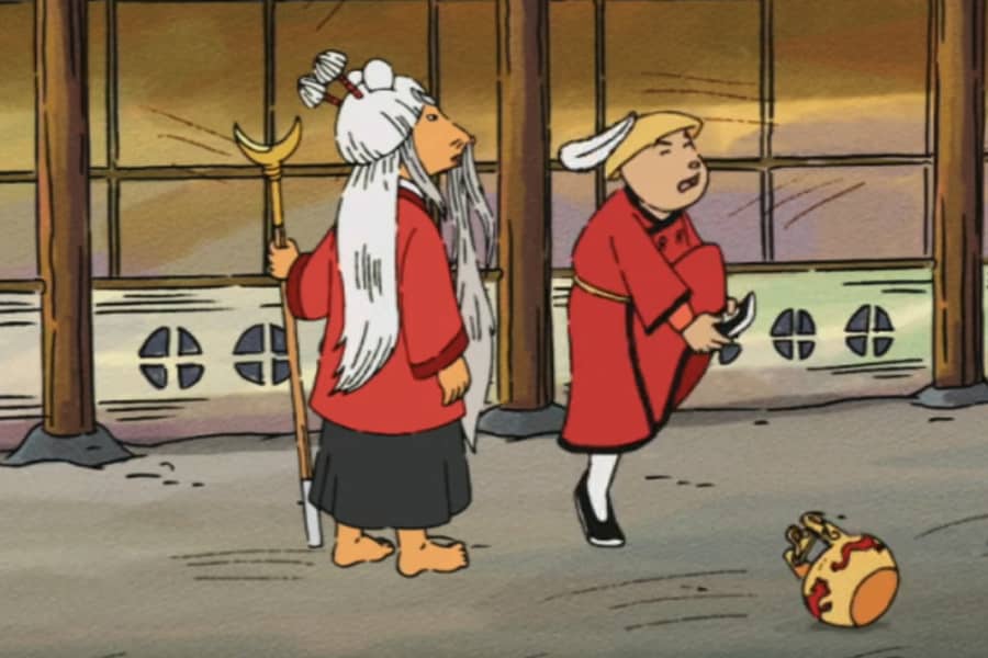 the apprentice holding his toe in pain