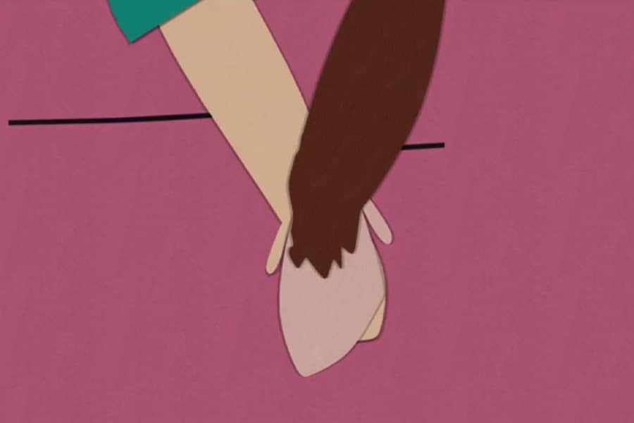 human and monkey holding hands