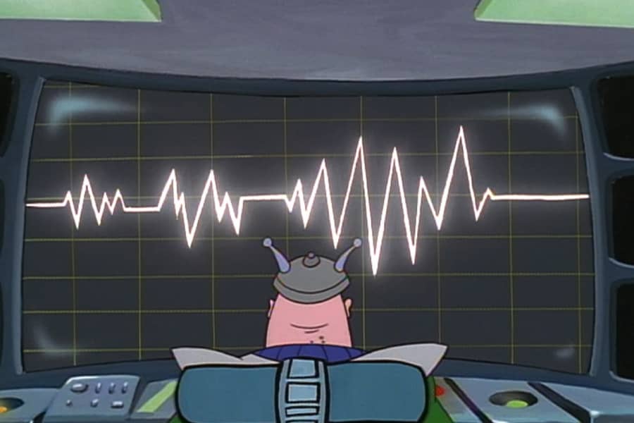 Mean Bob watching a large screen with activity monitor