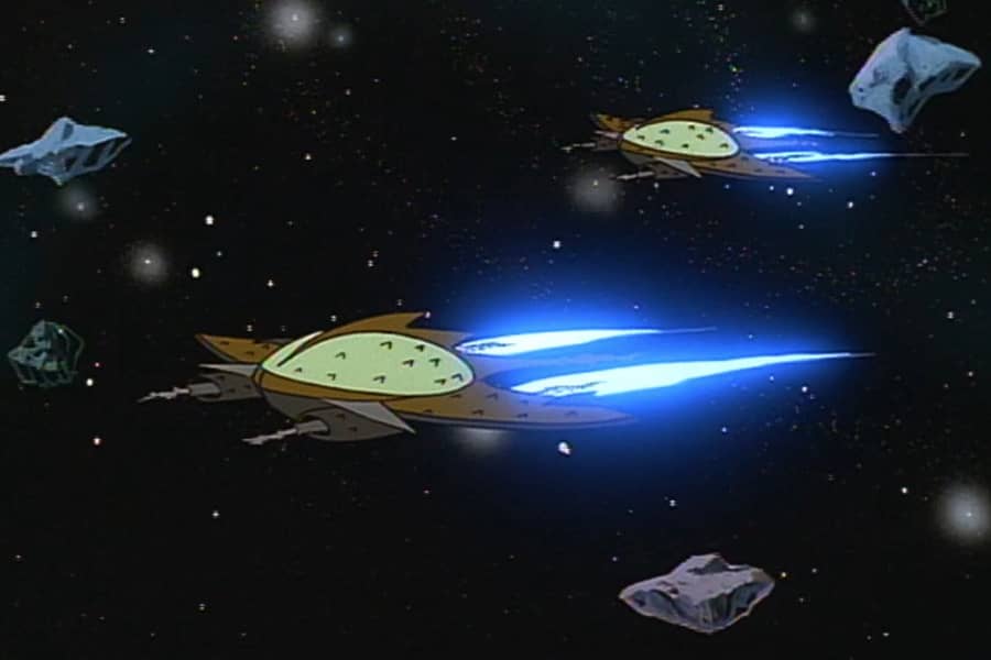 two alien ships flying through space