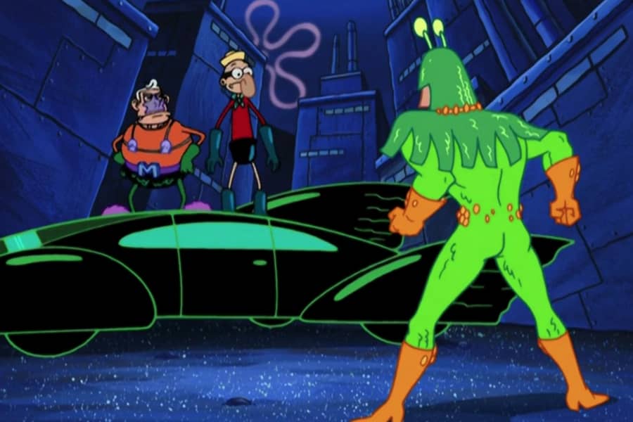 the heroes stand on a car and face off with Kelp Thing