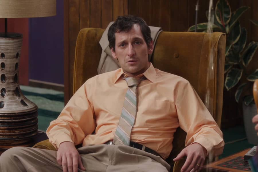 son-in-law in an armchair looking dejected
