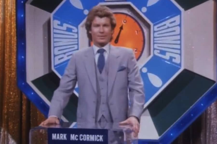 contestant Mark McCormick at a podium