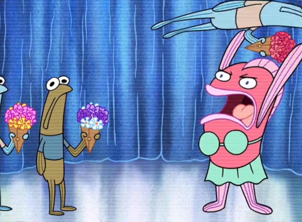 a line of guy fish with flowers for a lady fish who is angrily throwing one of the guys behind her