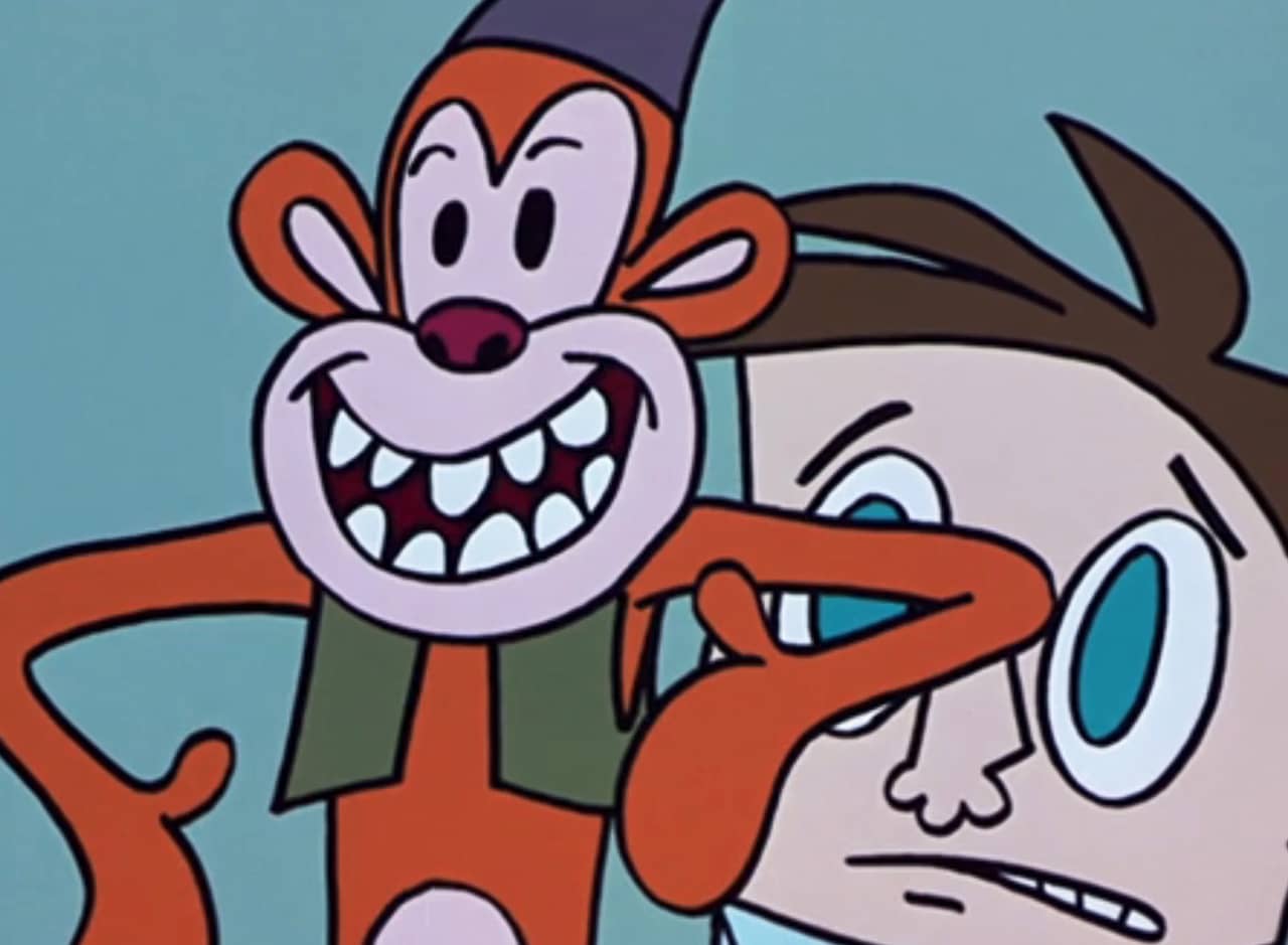 Monkeybone, a monkey in a vest, in front of a young boy