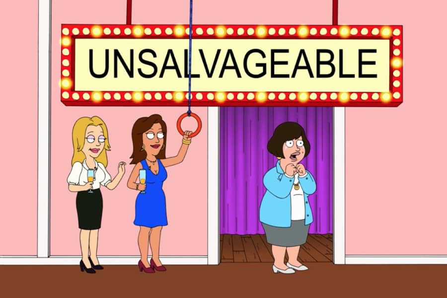 a sad woman below a sign that reads “Unsalvageable”
