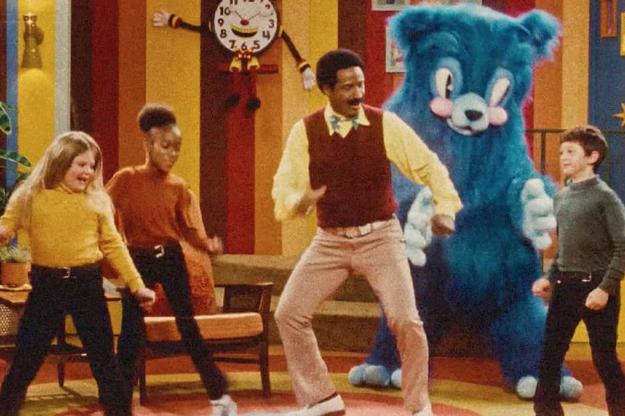 Mr. Crocket and Boogaloo Blue dance with some kids