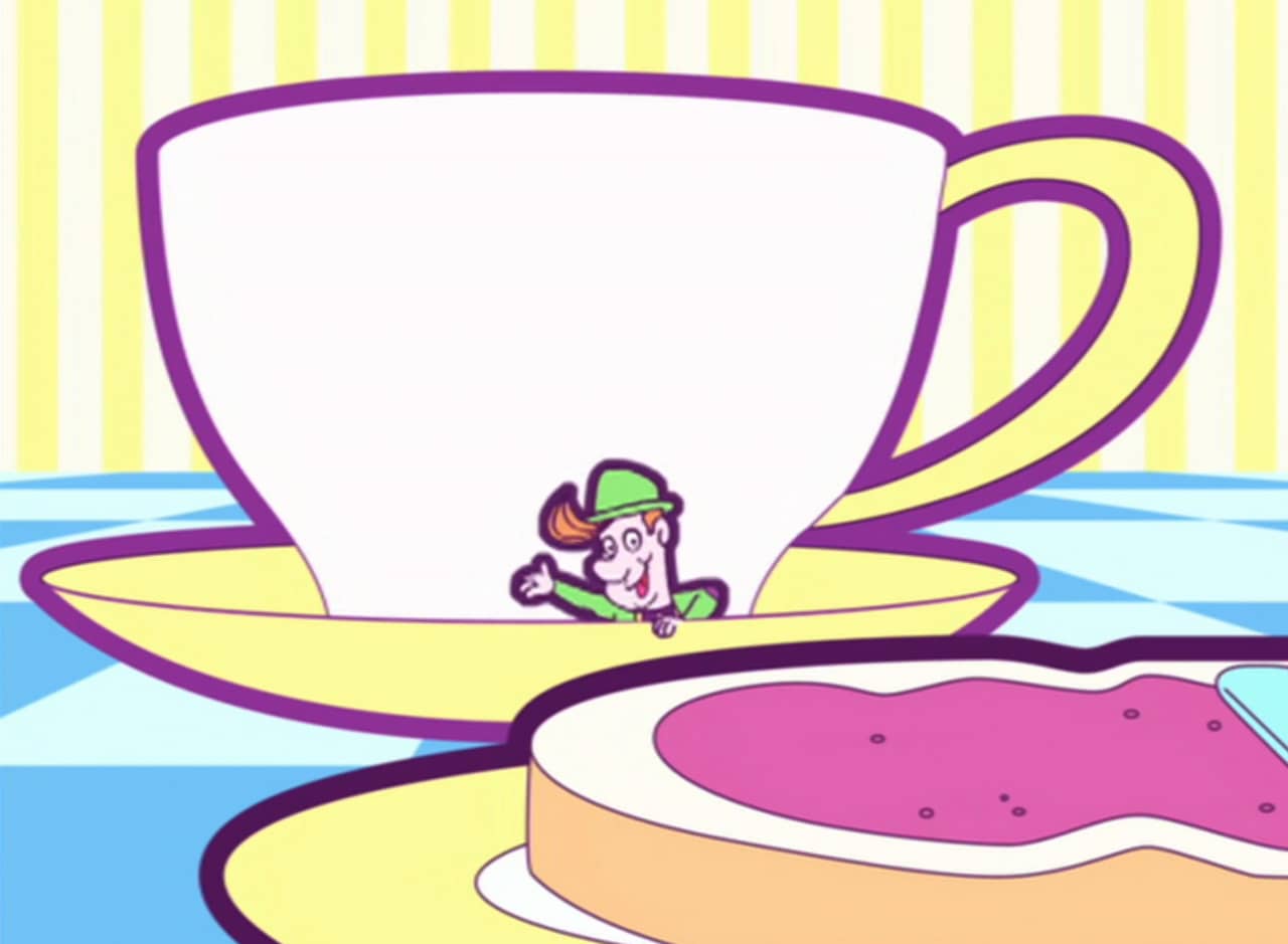 Mr. Tiny, a little leprechaun guy, waving from a tea saucer on a table